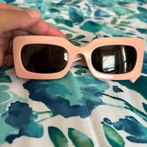 Le specs, pink sunglasses.